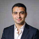 Headshot of a smiling male cybersecurity expert